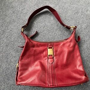 The Sak red leather purse